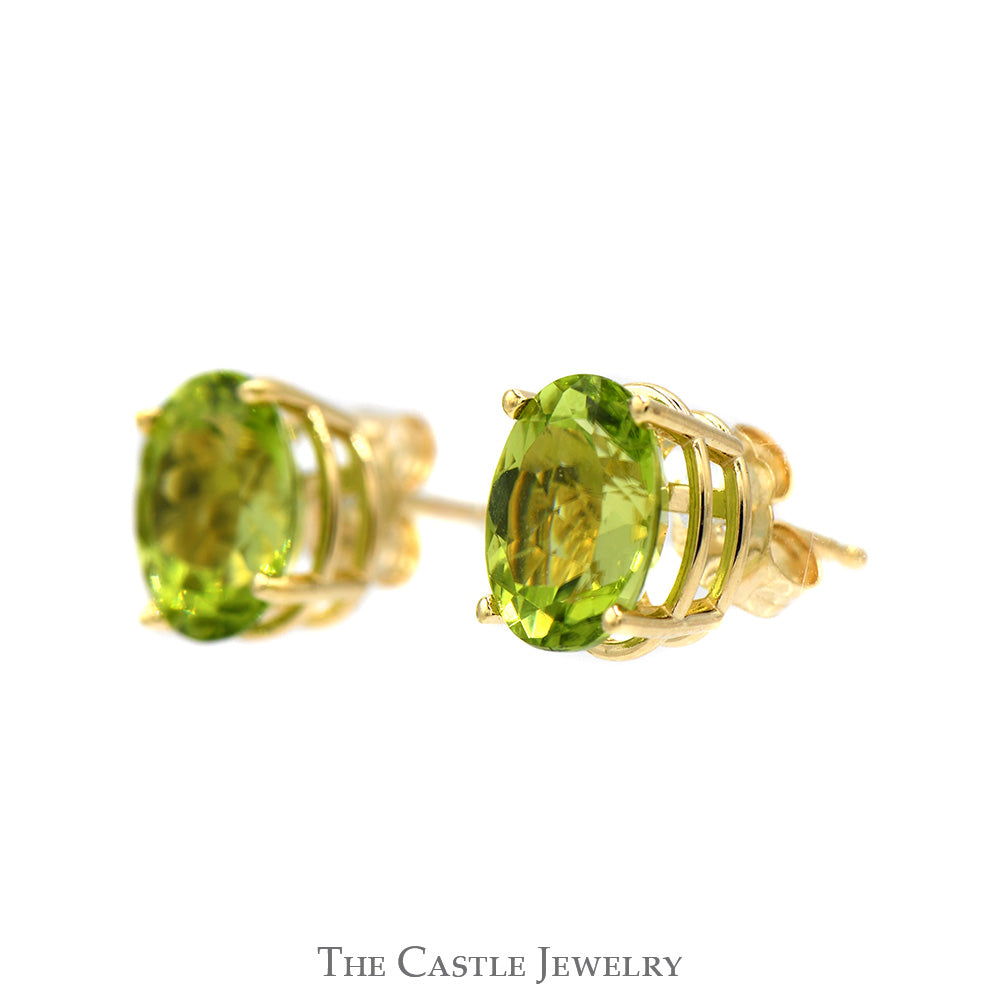 Oval Peridot Stud Earrings in 14k Yellow Gold Butterfly Pushbacks