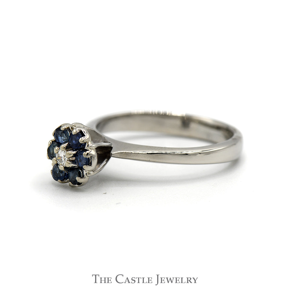 Sapphire And Diamond Flower Design Ring .05 CT Diamond Center In 14KT White Gold