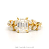 Emerald Cut Moissanite Ring with Pear Cut Moissanite Leaf Designed Accented Sides in 10k Yellow Gold - Thumbnail 1