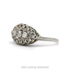 Side profile of the 14k white gold oval diamond cluster ring showing the domed openwork frame - Thumbnail 2