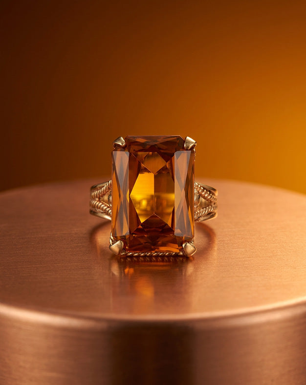 Large Emerald-Cut Citrine Cocktail Ring with Rope-Twist Shank in 10k Yellow Gold — lifestyle photography