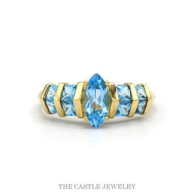 14k yellow gold marquise blue topaz row ring — top view