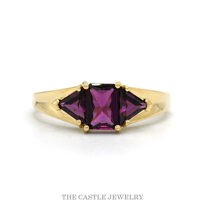 14k yellow gold emerald cut rhodolite garnet three stone ring — top view