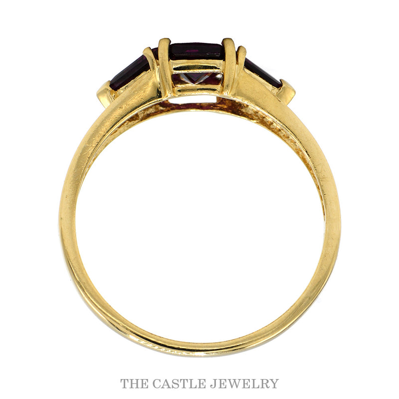 Front-facing view of the 14k yellow gold three stone garnet ring
