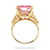 Front-facing view of the emerald cut pink ice ring with scroll designed sides in 10k yellow gold - Thumbnail 3