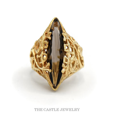 Large marquise smoky quartz ring in an open freeform 10k yellow gold mounting — top view