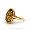 Side profile of the oval citrine ring showing the stone raised above the brushed scalloped frame - Thumbnail 2