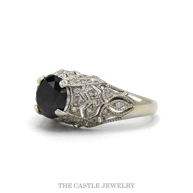 Side profile of the 14k white gold antique filigree black diamond ring showing the pierced openwork