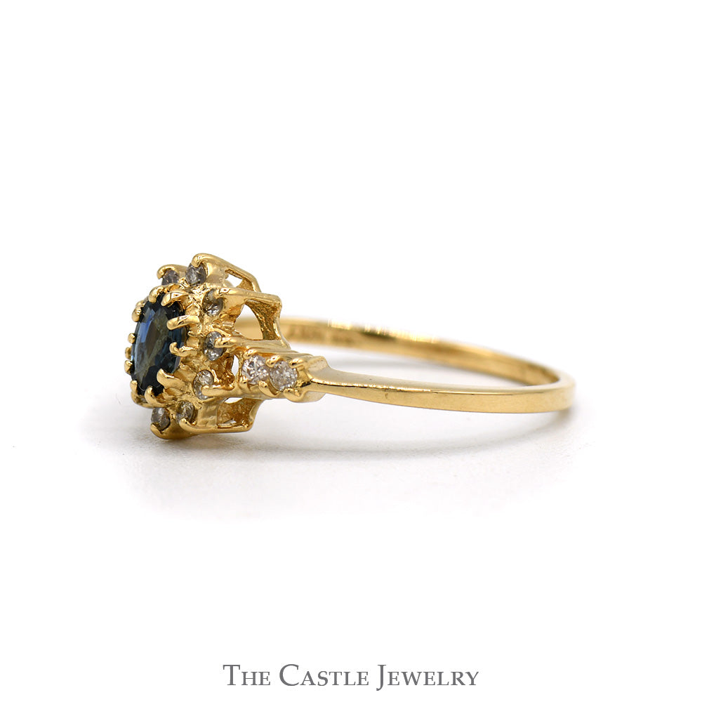 Oval Cut Sapphire Ring With Diamond Halo And Sides .10CTTW In 14KT Yellow Gold