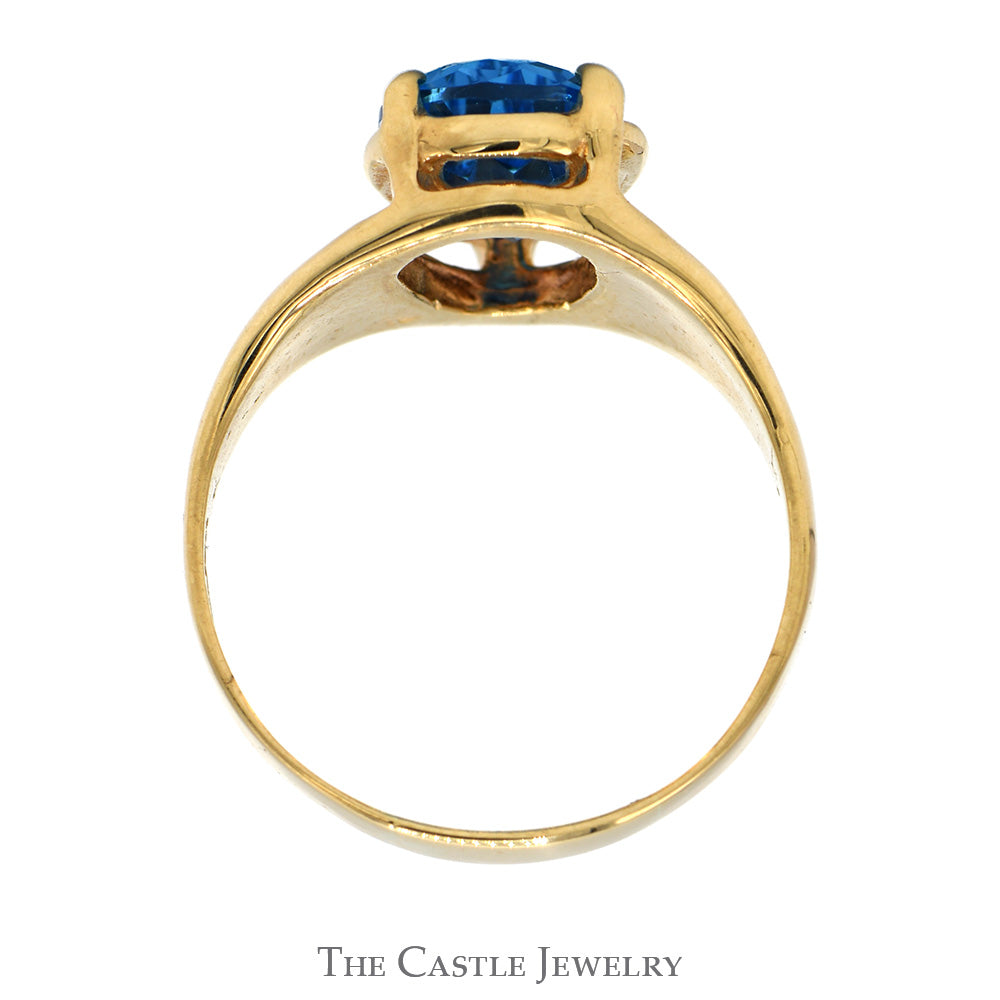 Pear Cut Blue Topaz Ring with Tapered Band in 10k Yellow Gold