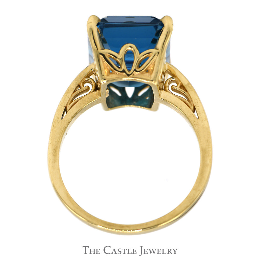 Emerald Cut Blue Topaz Solitaire Ring in 14k Yellow Gold