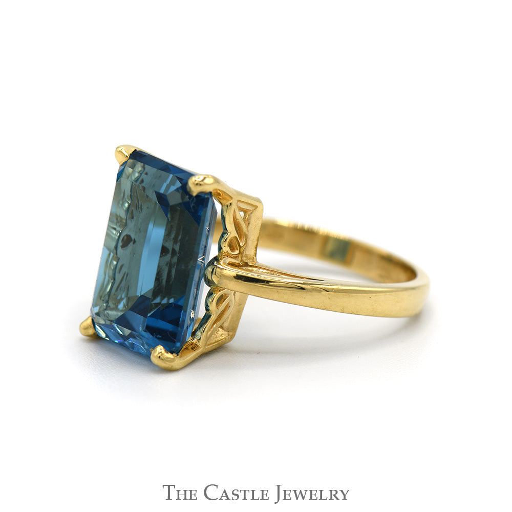 Emerald Cut Blue Topaz Solitaire Ring in 14k Yellow Gold