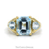Emerald Cut Blue Topaz Ring with Trillion Cut Topaz Sides in 10k Yellow Gold - Thumbnail 1