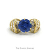 Round Synthetic Sapphire Ring with Channel Set Baguette Cut Cubic Zirconia Accents in 10k Yellow Gold - Thumbnail 1