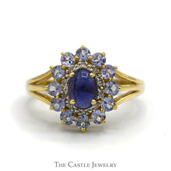 Oval Cabochon Tanzanite Ring with Round Tanzanite and Illusion Set Diamond Halo in 10k Yellow Gold