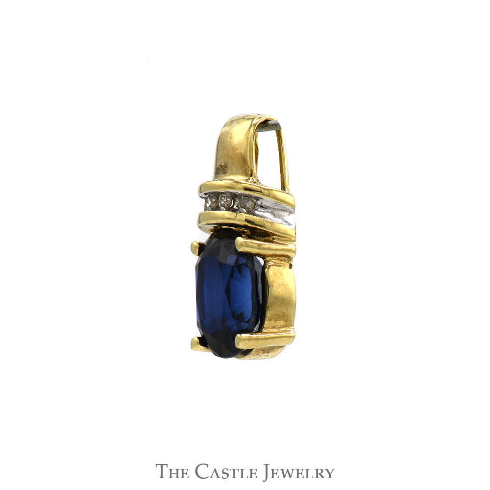 Oval Sapphire Pendant with Diamond Accents in 10k Yellow Gold