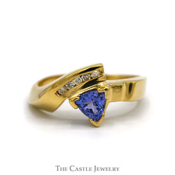 Trillion Cut Tanzanite Ring with Channel Set Diamond Accents in 14k Yellow Gold Bypass Mounting