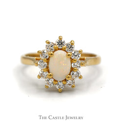 Oval Opal Ring with Cubic Zirconia Halo in 14k Yellow Gold