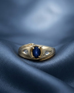 Blue Lindy Star Sapphire Ring with Diamond Accent Sides in 10k Yellow Gold