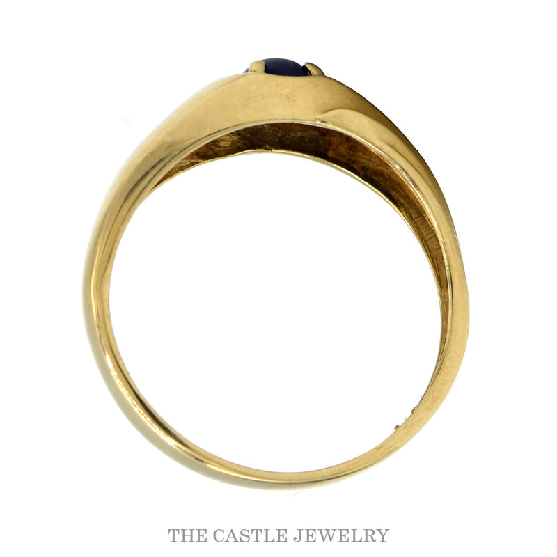 Front-facing view of the 10k yellow gold blue star sapphire ring