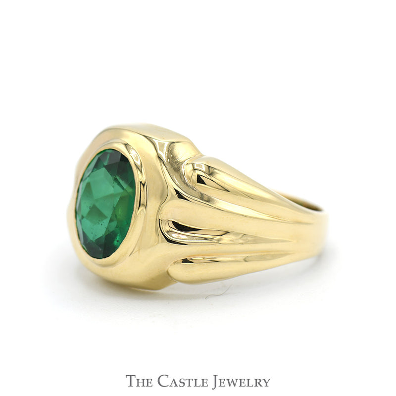 Oval Bezel Set Synthetic Emerald Ring with Concaved Grooved Sides in 10k Yellow Gold