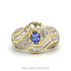 Oval Cut Tanzanite Ring with Round and Baguette Diamond Cluster Accents in 14k Yellow Gold - Thumbnail 1
