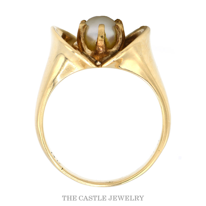 Front-facing view of the 14k yellow gold pearl ring