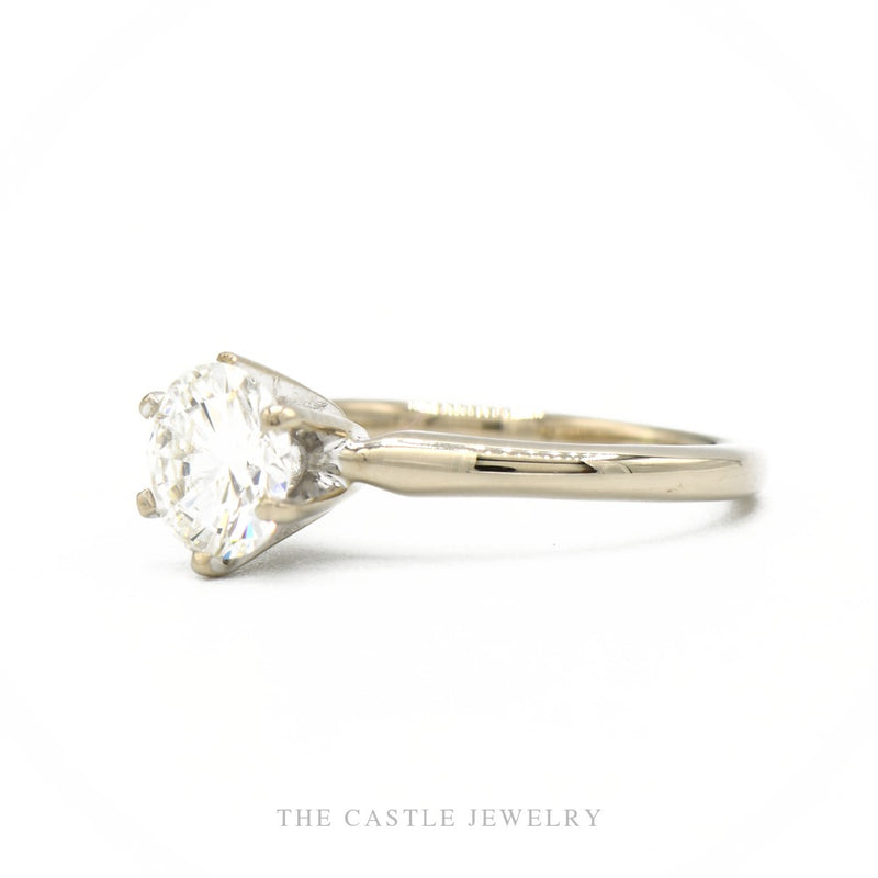 Side profile of the 14k white gold diamond solitaire ring showing prong head height and tapered shank
