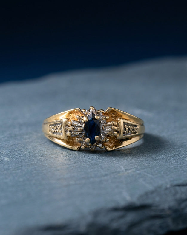 0.83ctw Marquise Sapphire Ring with Baguette Diamond Halo in 10k Yellow Gold