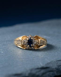 0.83ctw Marquise Sapphire Ring with Baguette Diamond Halo in 10k Yellow Gold