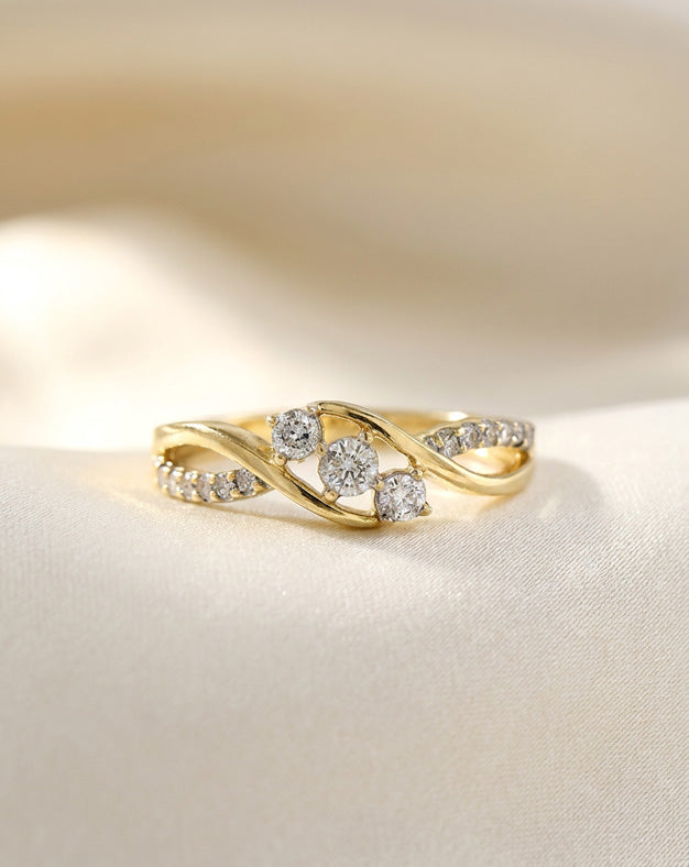 0.33ctw Three-Stone Diamond Bypass Ring with Twist Shanks in 10k Yellow Gold