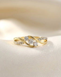 0.33ctw Three-Stone Diamond Bypass Ring with Twist Shanks in 10k Yellow Gold