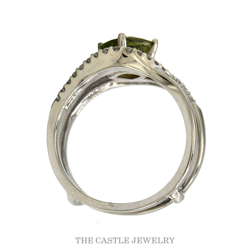 Front-facing view of the cushion peridot freeform ring with diamond bypass rows in 14k white gold