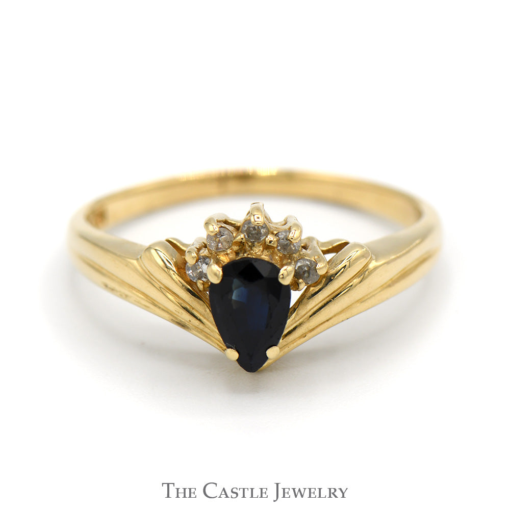 Pear Shaped Sapphire Ring with Round Diamond Accents in 14k Yellow Gold
