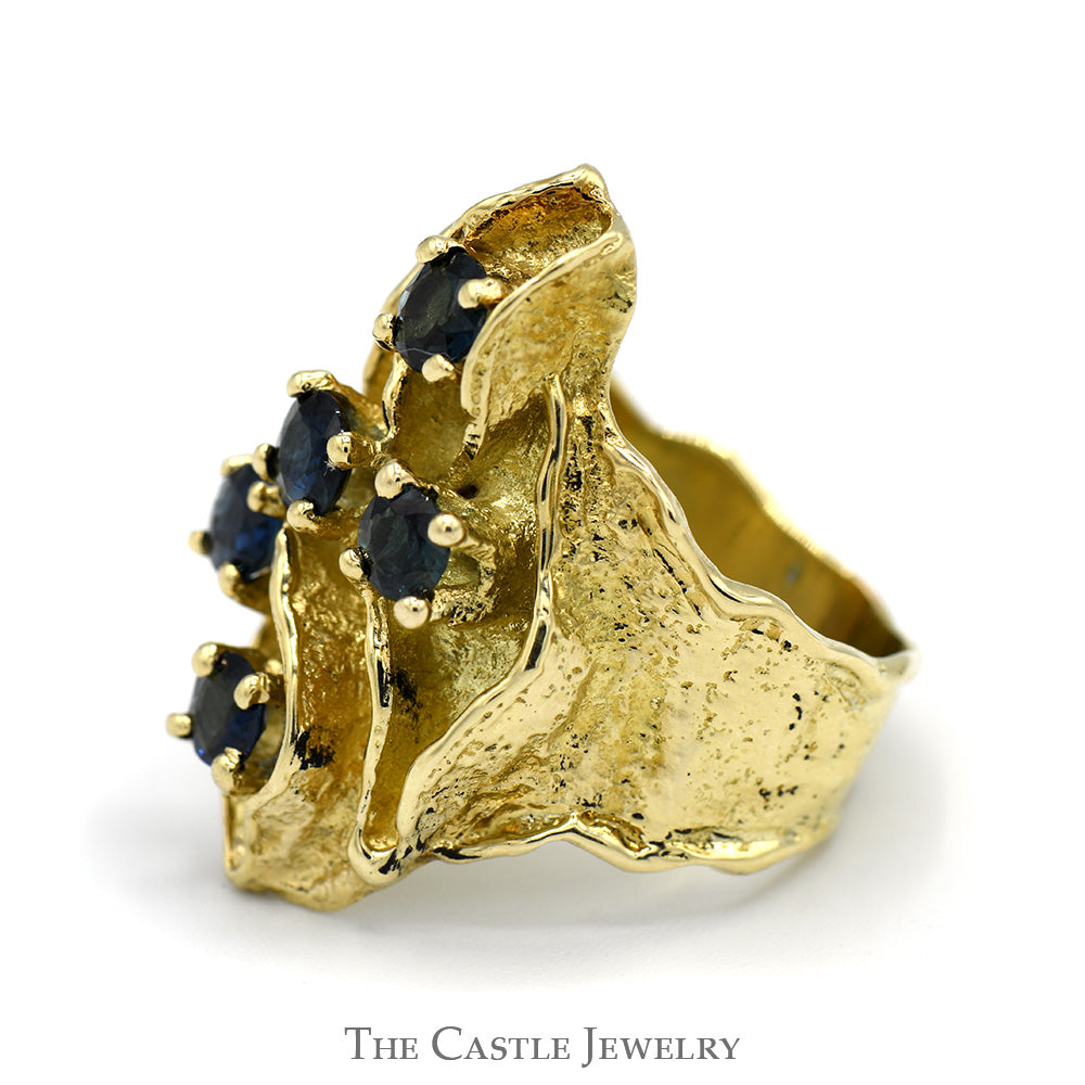 Round Sapphire Cluster Ring with Unique Freeform Shield Design in 14k Yellow Gold Ridged Mounting