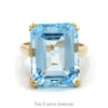 Emerald Cut Blue Topaz Ring in 10k Yellow Gold Cathedral Mounting - Thumbnail 1