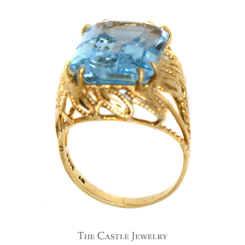 Emerald Cut Blue Topaz Ring with Fancy Leaf Designed Open Setting in 10k Yellow Gold