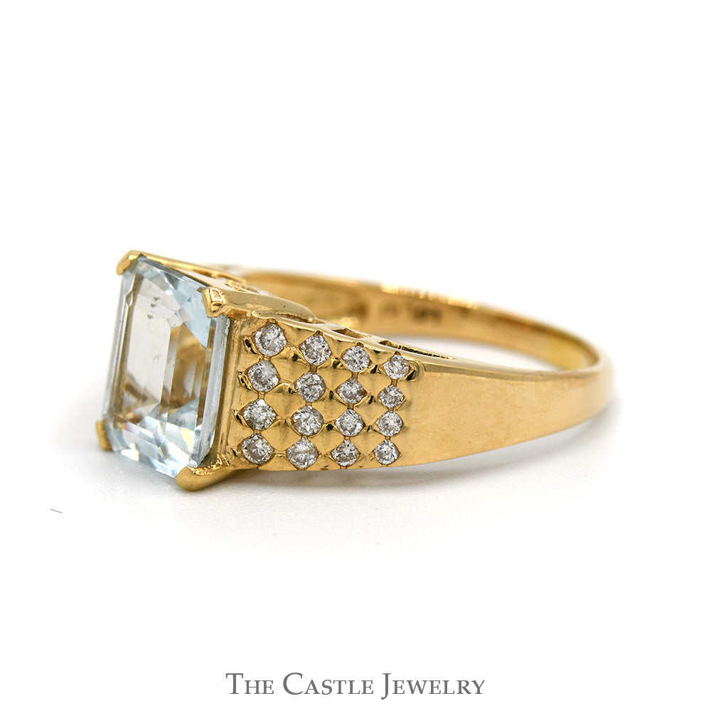 Emerald Cut Aquamarine Ring with Diamond Cluster Sides in 14k Yellow Gold
