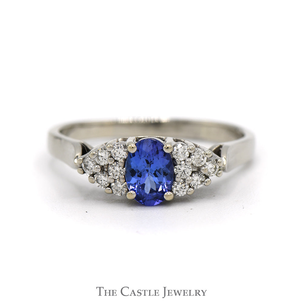 Oval Cut Tanzanite Ring with Diamond Cluster Accented Sides in 14k White Gold