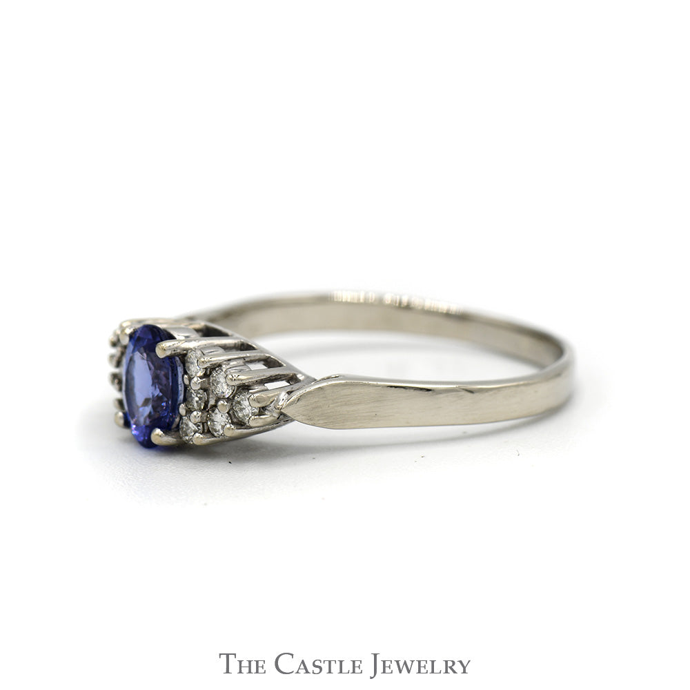 Oval Cut Tanzanite Ring with Diamond Cluster Accented Sides in 14k White Gold