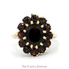 Oval Garnet Ring with Round Garnet Halo in 10k Yellow Gold - Thumbnail 1