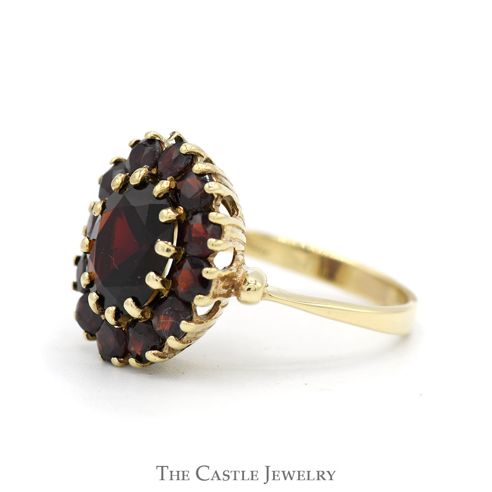 Oval Garnet Ring with Round Garnet Halo in 10k Yellow Gold