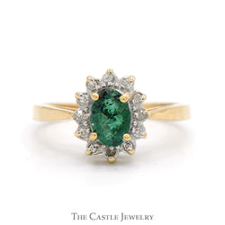 Oval Cut Emerald Ring with Diamond Halo in 14k Yellow Gold