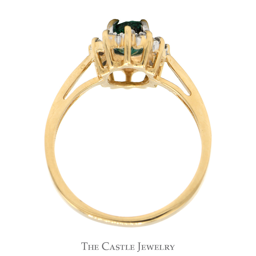 Oval Cut Emerald Ring with Diamond Halo in 14k Yellow Gold