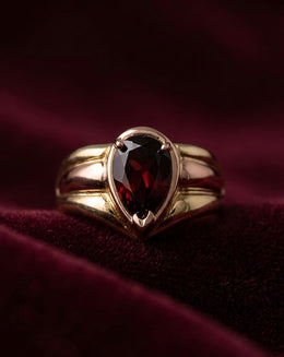 Pear-Shaped Garnet Ring with Grooved Band in 14k Yellow Gold