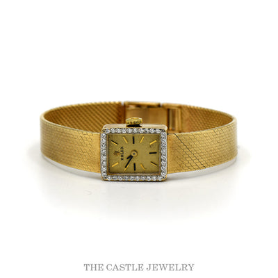Vintage ladies Rolex cocktail watch with diamond bezel and champagne dial on a 14k yellow gold mesh bracelet — top view