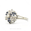 Side profile of the 14k white gold snowflake cluster ring showing cluster height and openwork gallery - Thumbnail 3