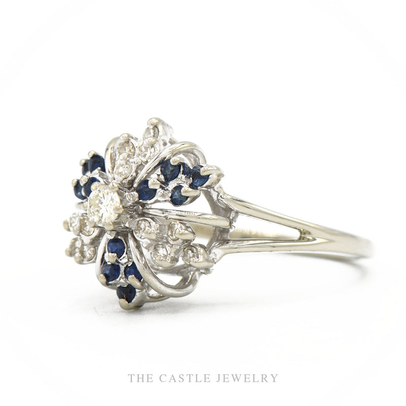 Side profile of the 14k white gold snowflake cluster ring showing cluster height and openwork gallery