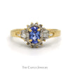 Oval Cut Tanzanite Ring With Diamond Halo And Sides .20 CTTW In 14KT Yellow Gold - Thumbnail 1