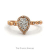 Pear Shaped Diamond Halo Cluster Ring With .25 CTTW Round Diamonds In 10KT Rose Gold - Thumbnail 1